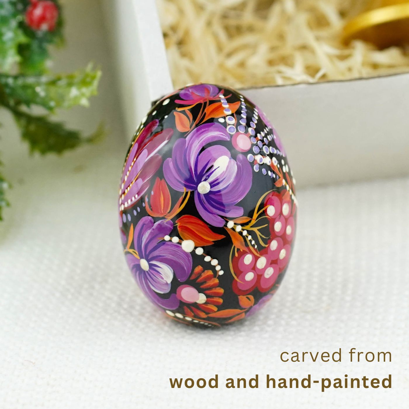 Hand-painted purple bird Easter egg carved from wood