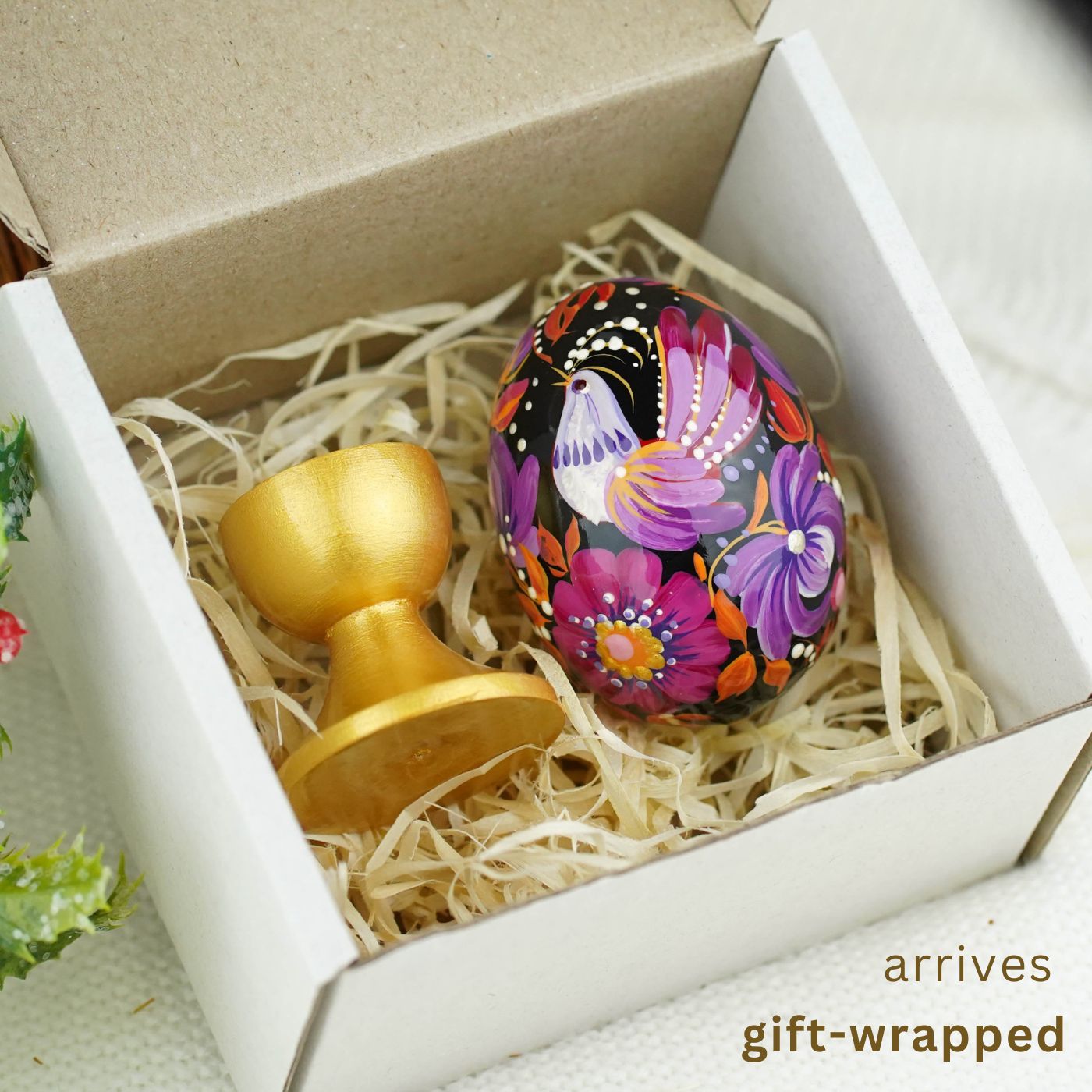 Hand-painted purple bird Easter egg carved from wood