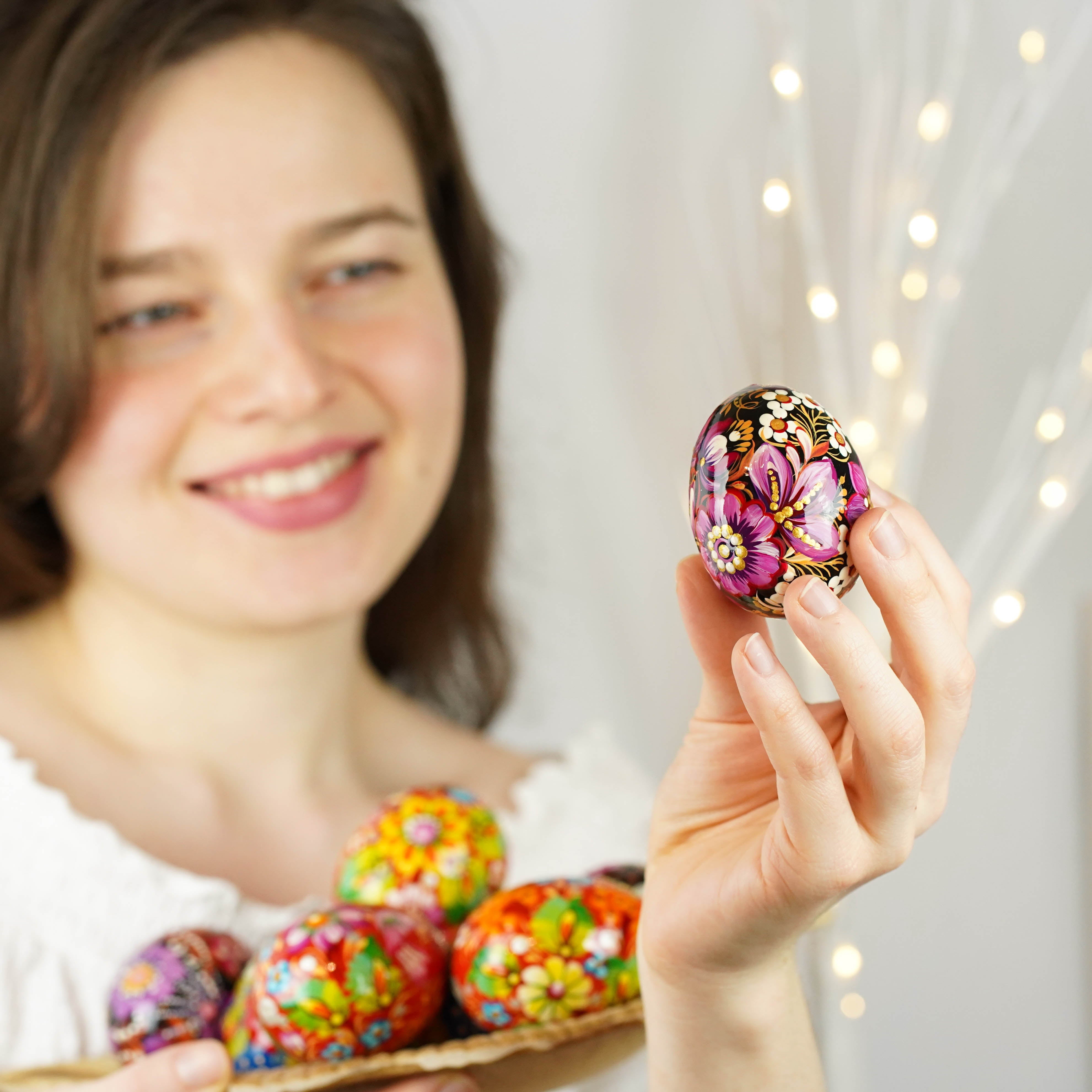 Hand-painted purple butterfly Easter egg carved from wood