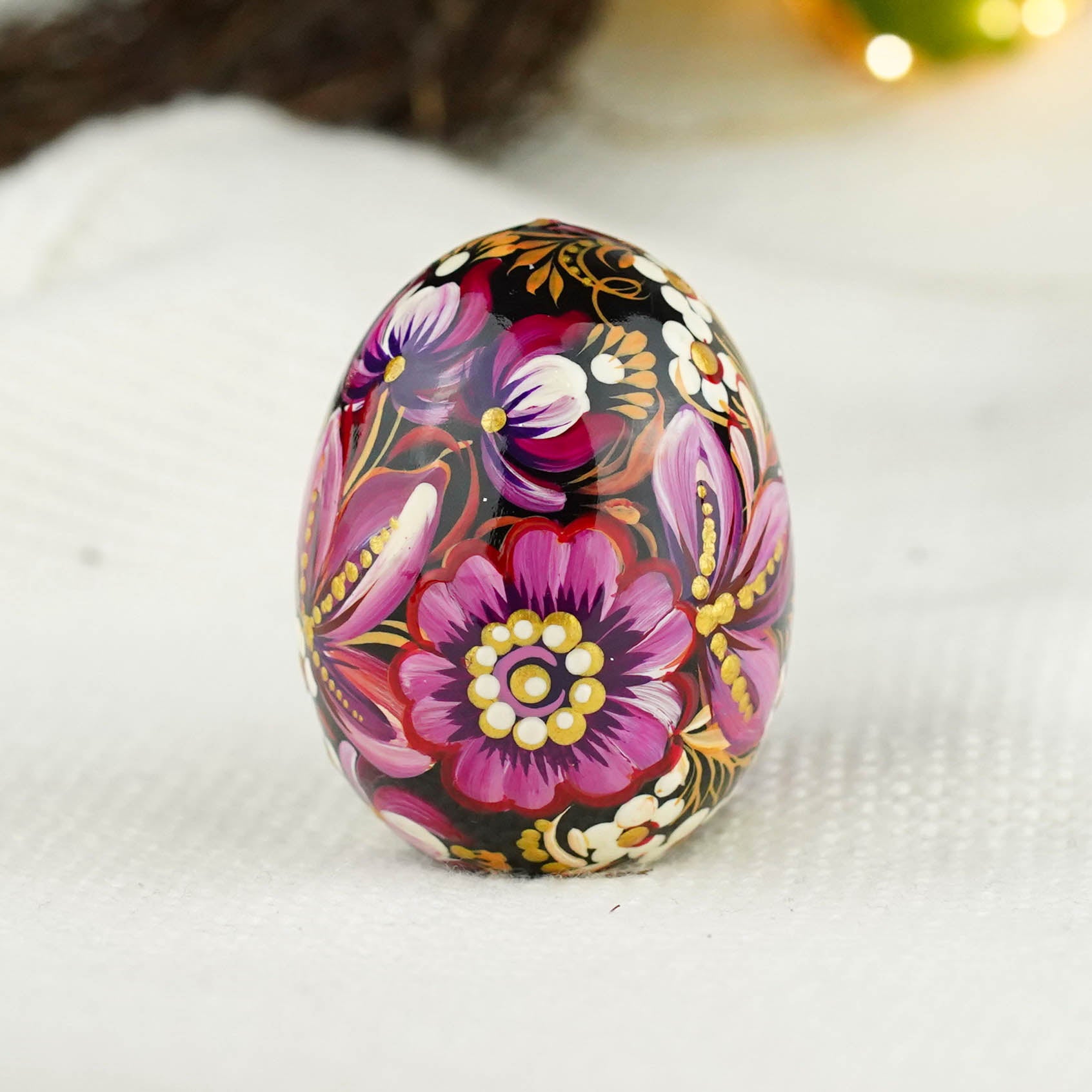 Hand-painted purple butterfly Easter egg carved from wood