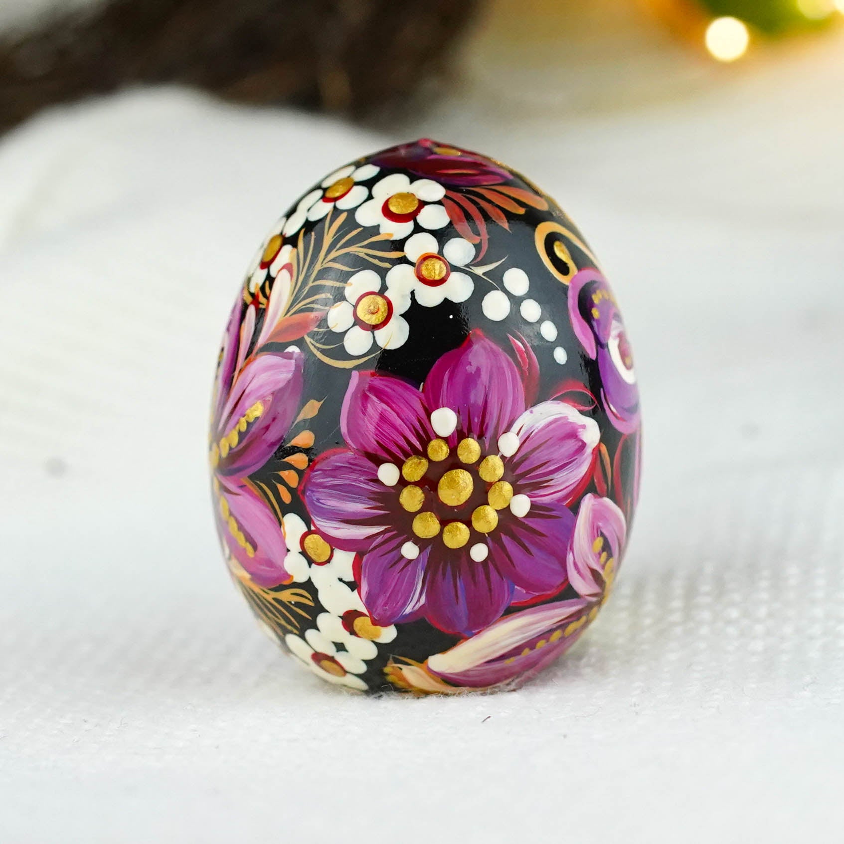 Hand-painted purple butterfly Easter egg carved from wood