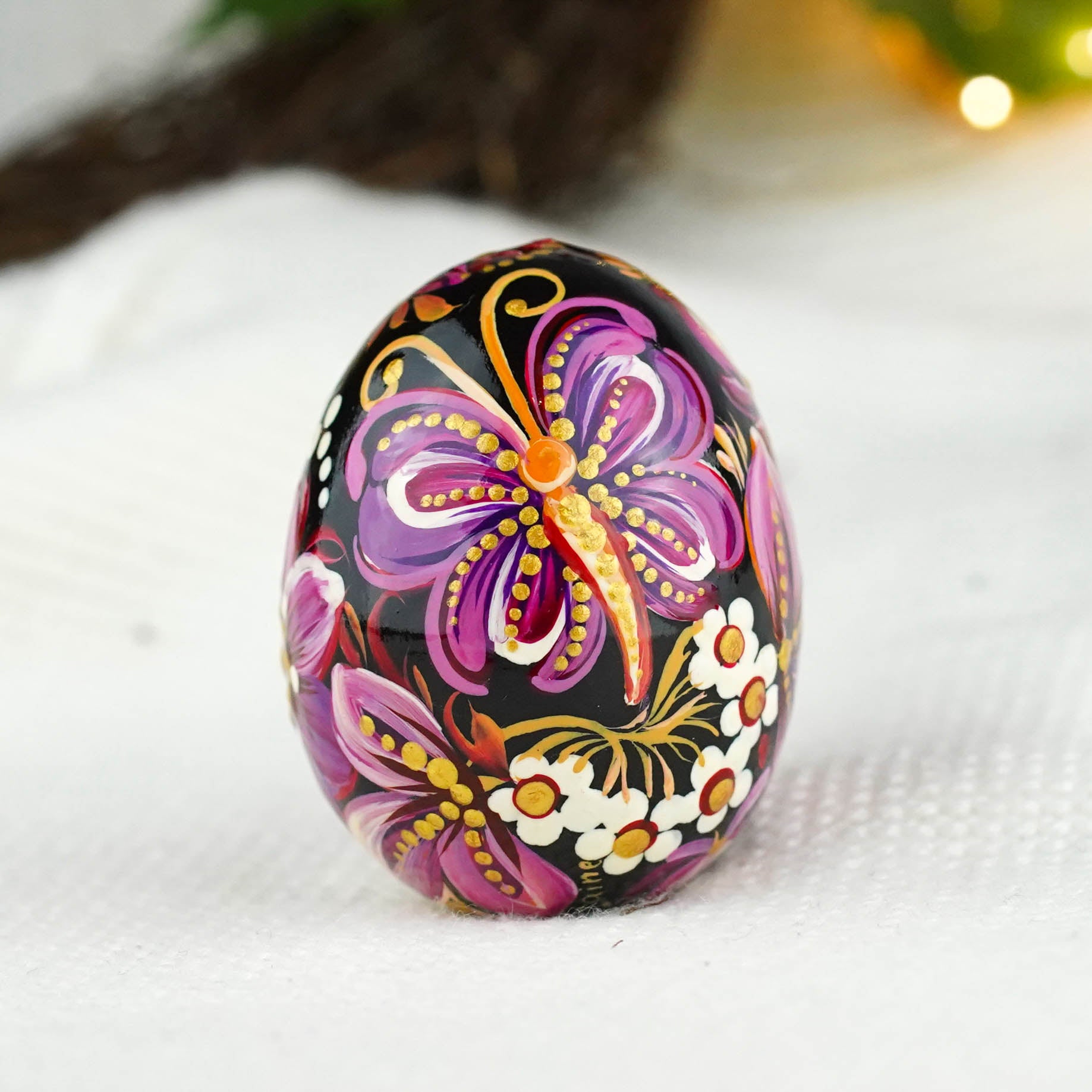 Hand-painted purple butterfly Easter egg carved from wood