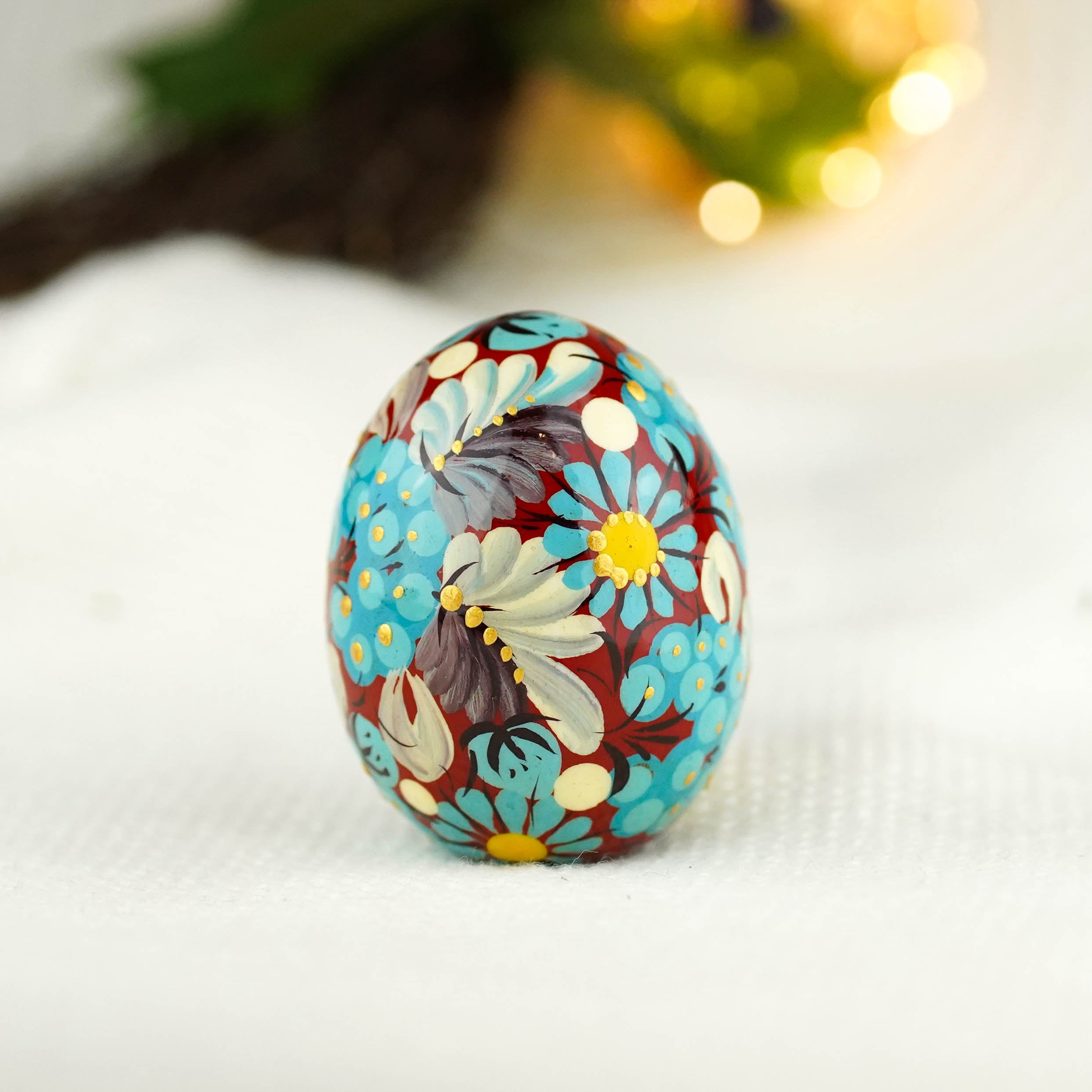 Hand painted wooden burgundy and blue flower Easter egg