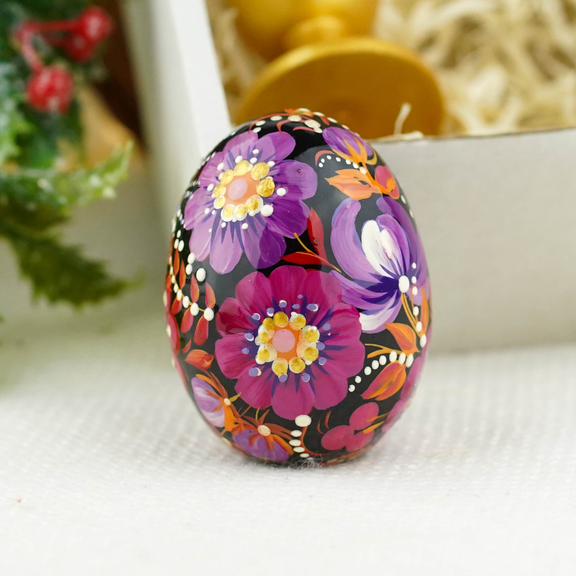 Hand-painted purple bird Easter egg carved from wood