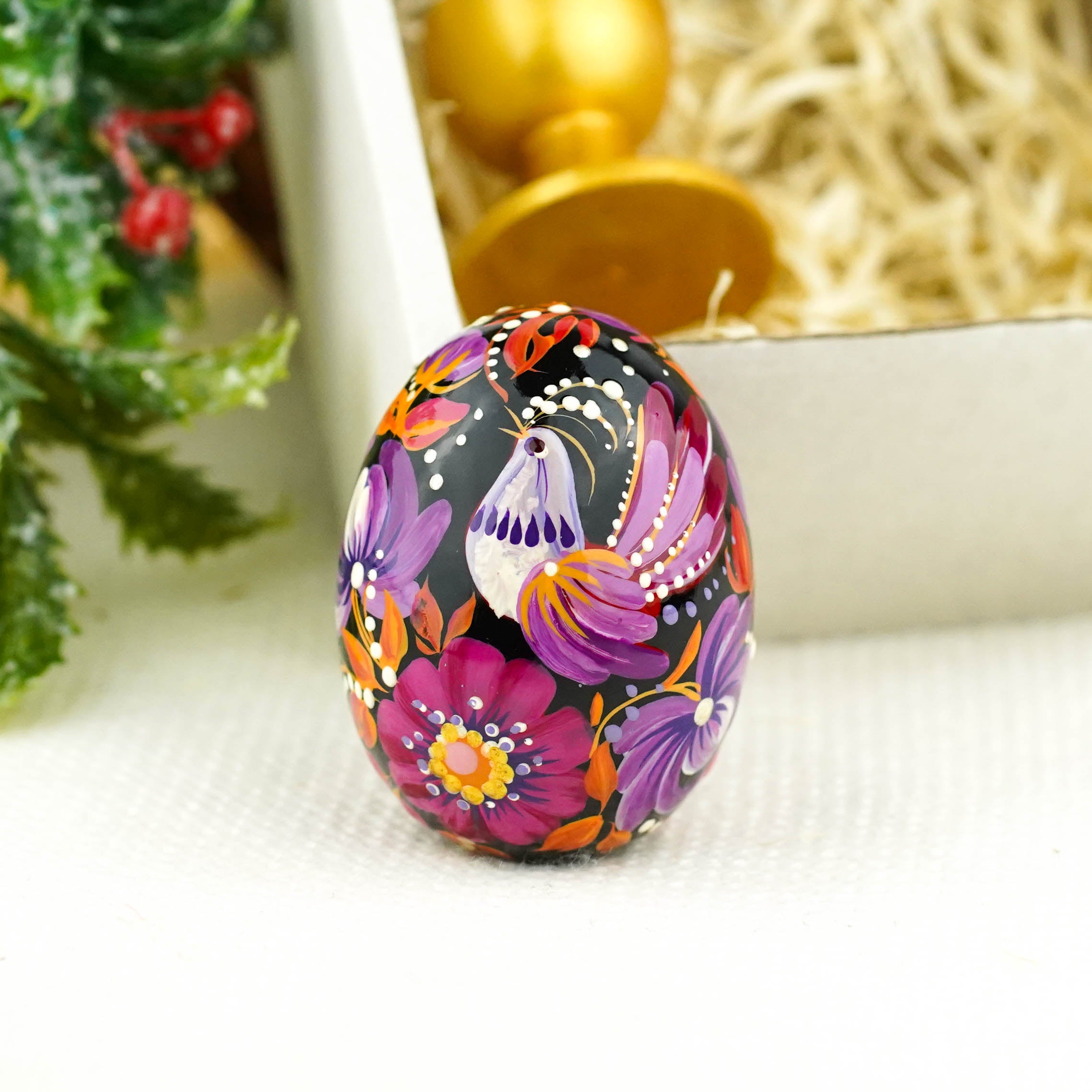 Hand-painted purple bird Easter egg carved from wood