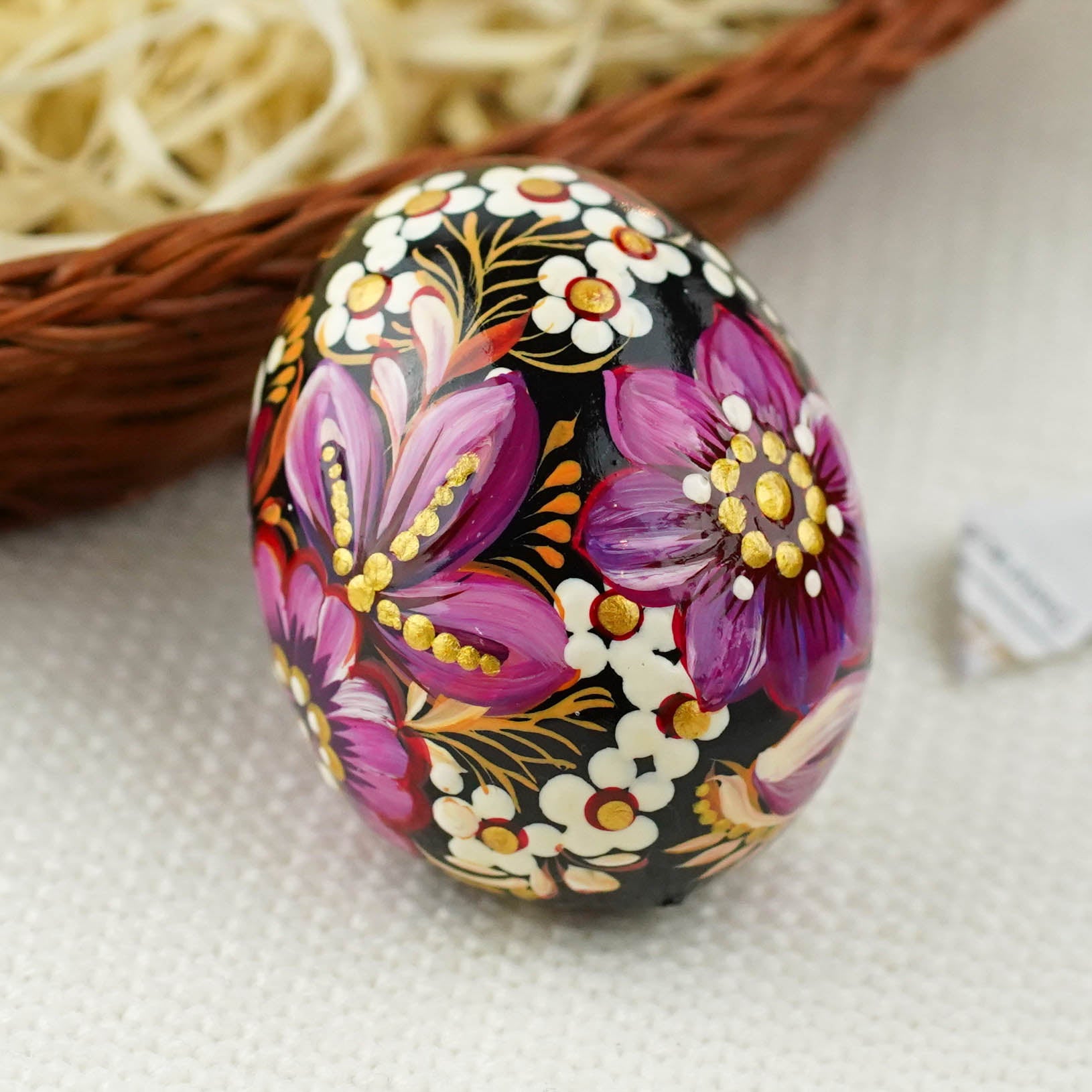 Hand-painted purple butterfly Easter egg carved from wood