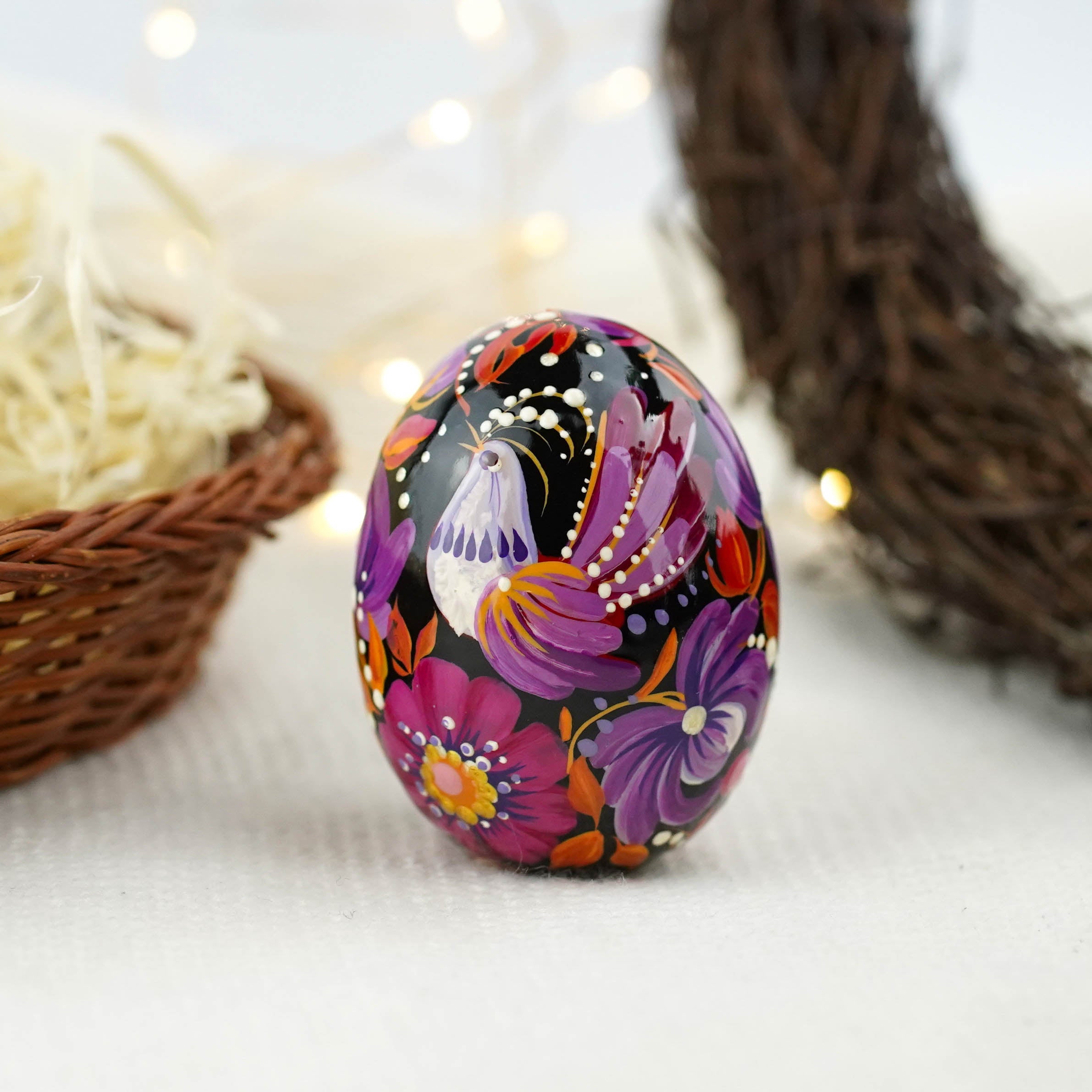 Hand-painted purple bird Easter egg carved from wood