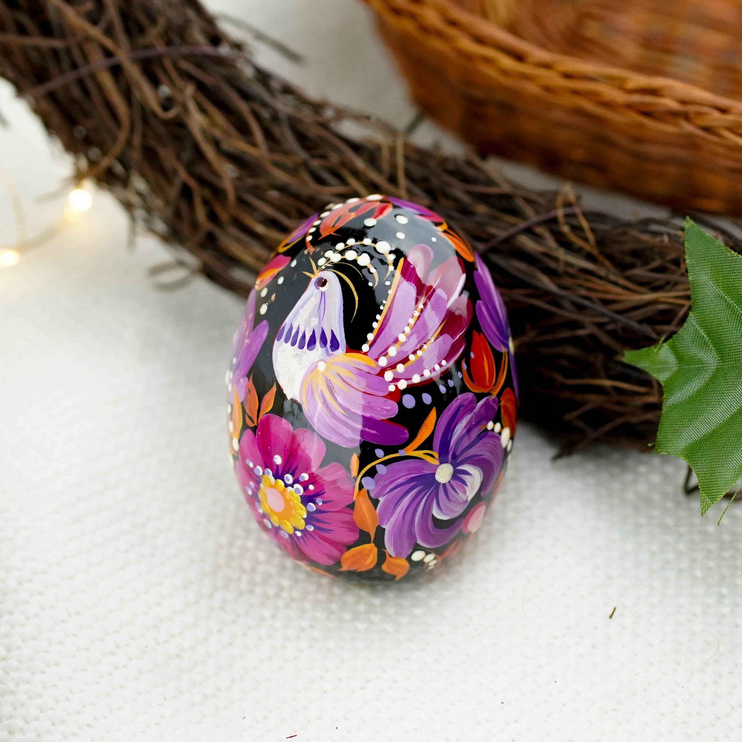 Hand-painted purple bird Easter egg carved from wood