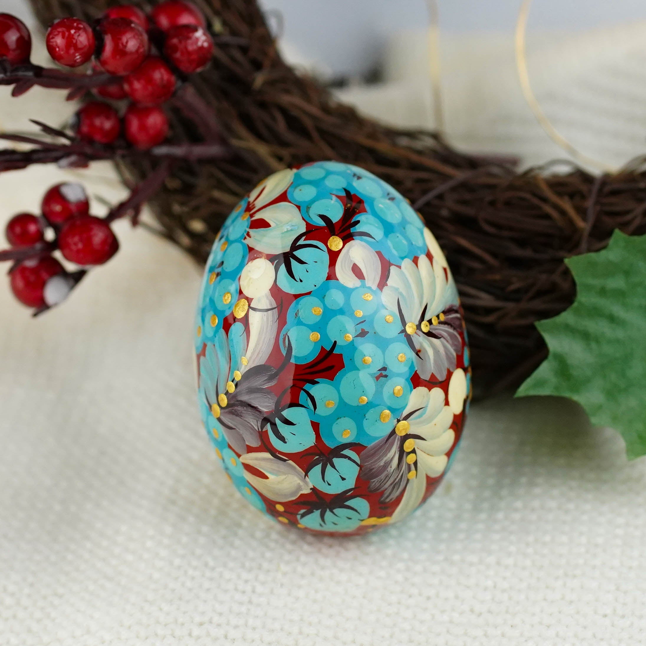 Hand painted wooden burgundy and blue flower Easter egg