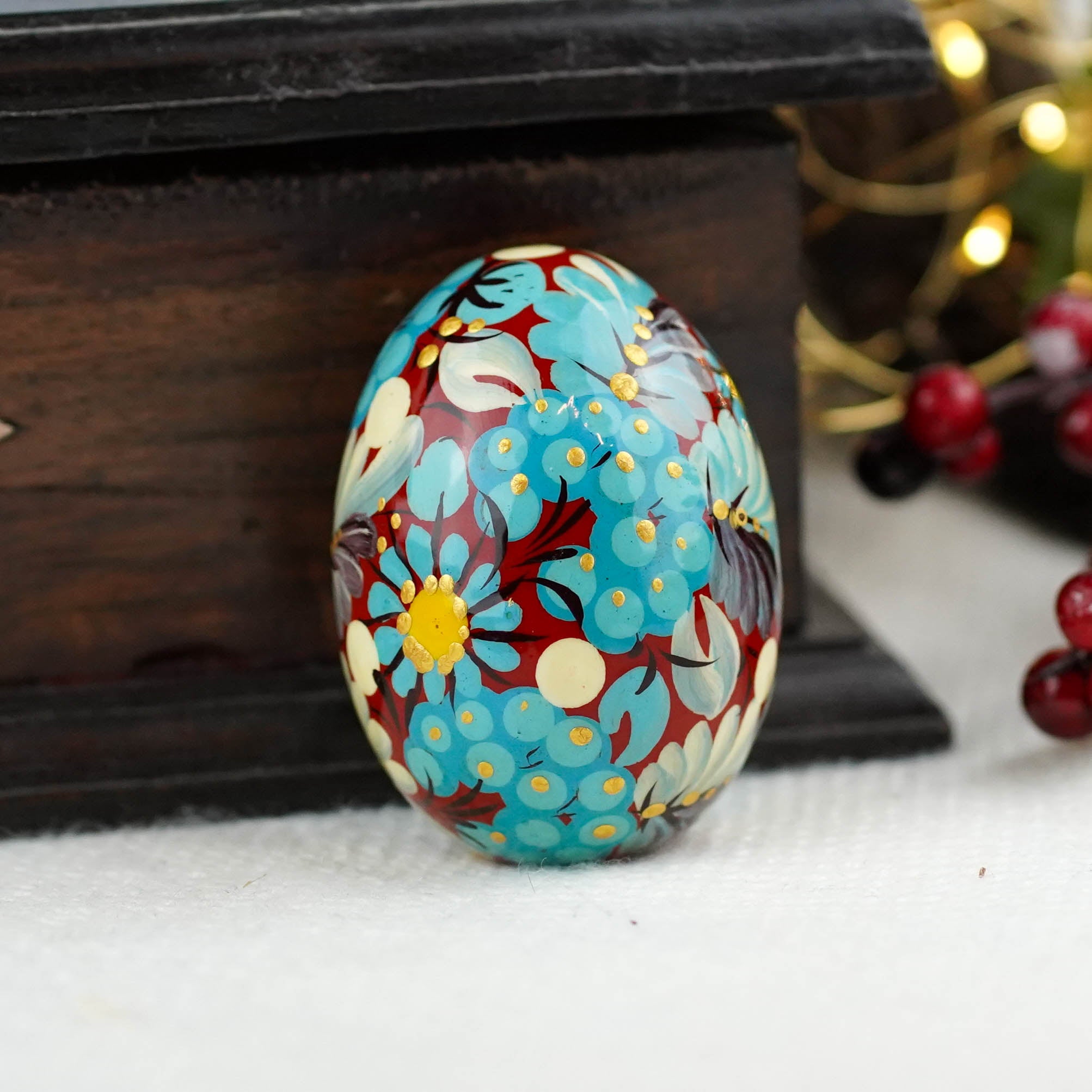 Hand painted wooden burgundy and blue flower Easter egg