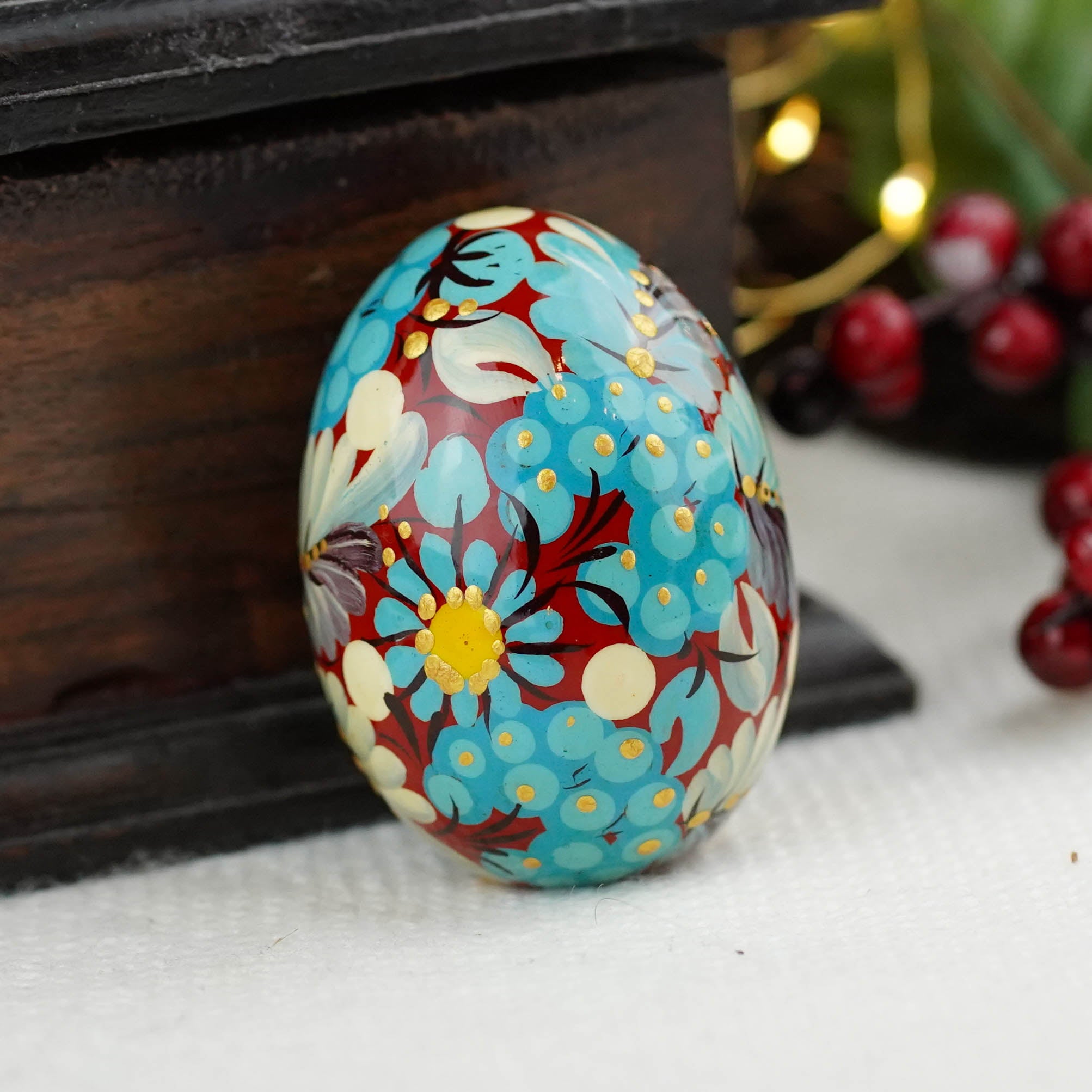 Hand painted wooden burgundy and blue flower Easter egg