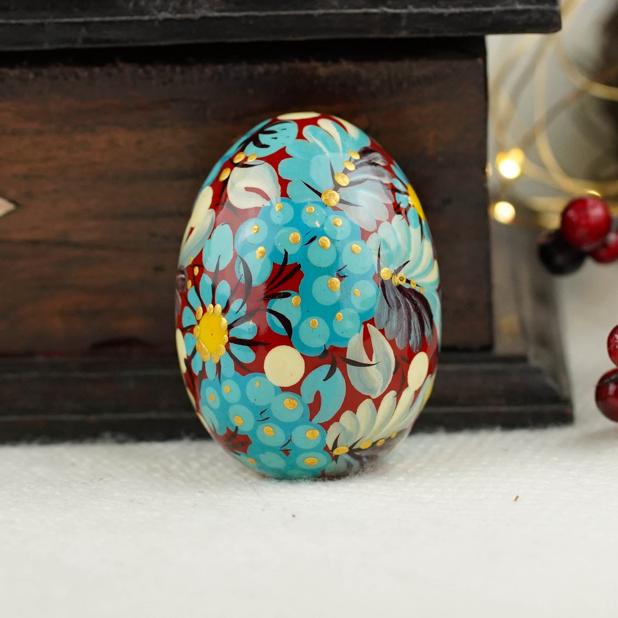 Hand painted wooden burgundy and blue flower Easter egg