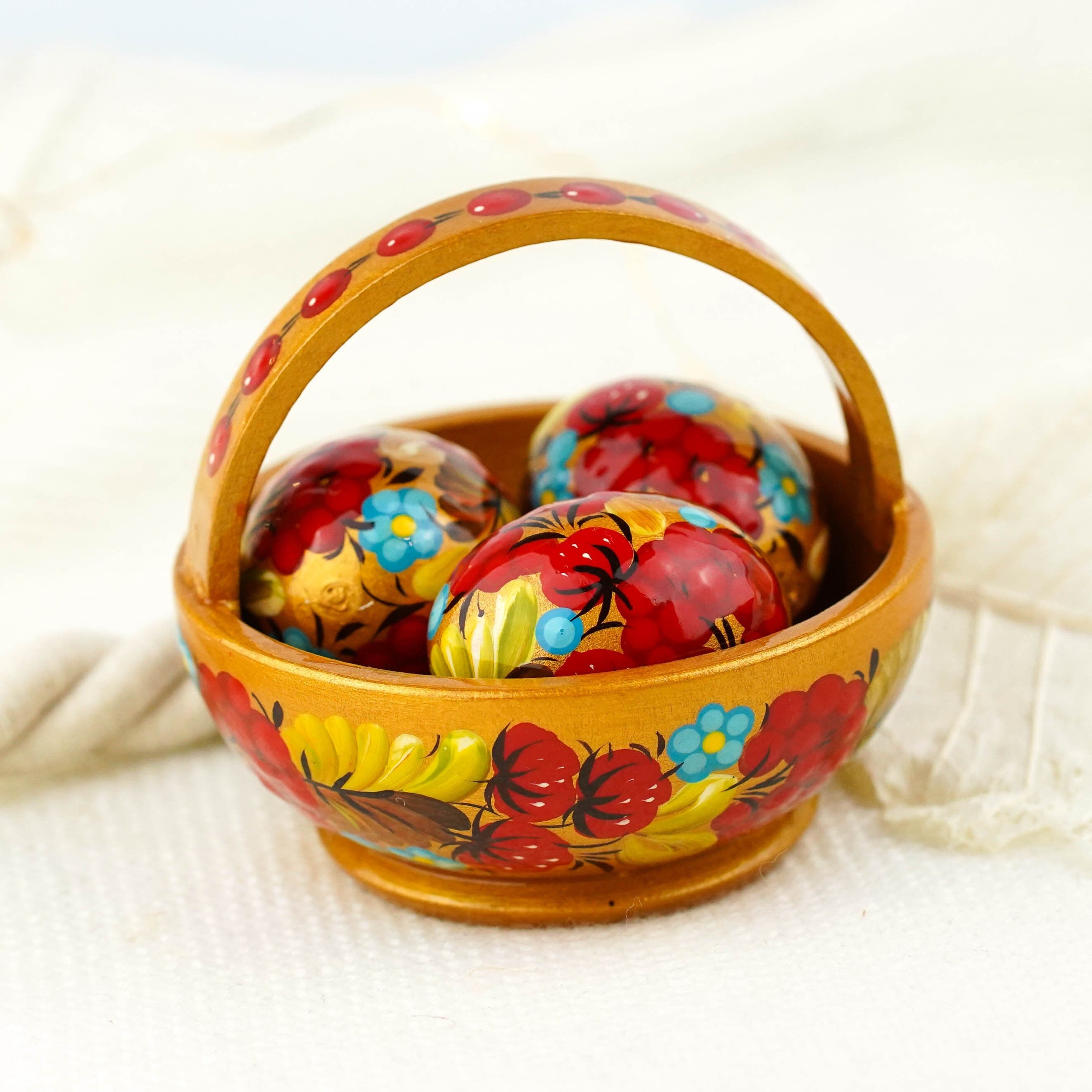 Wooden Easter basket with mini eggs, Painted small Petrykivka eggs, Red & gold flower Easter eggs in the basket, Cute Easter decor for home