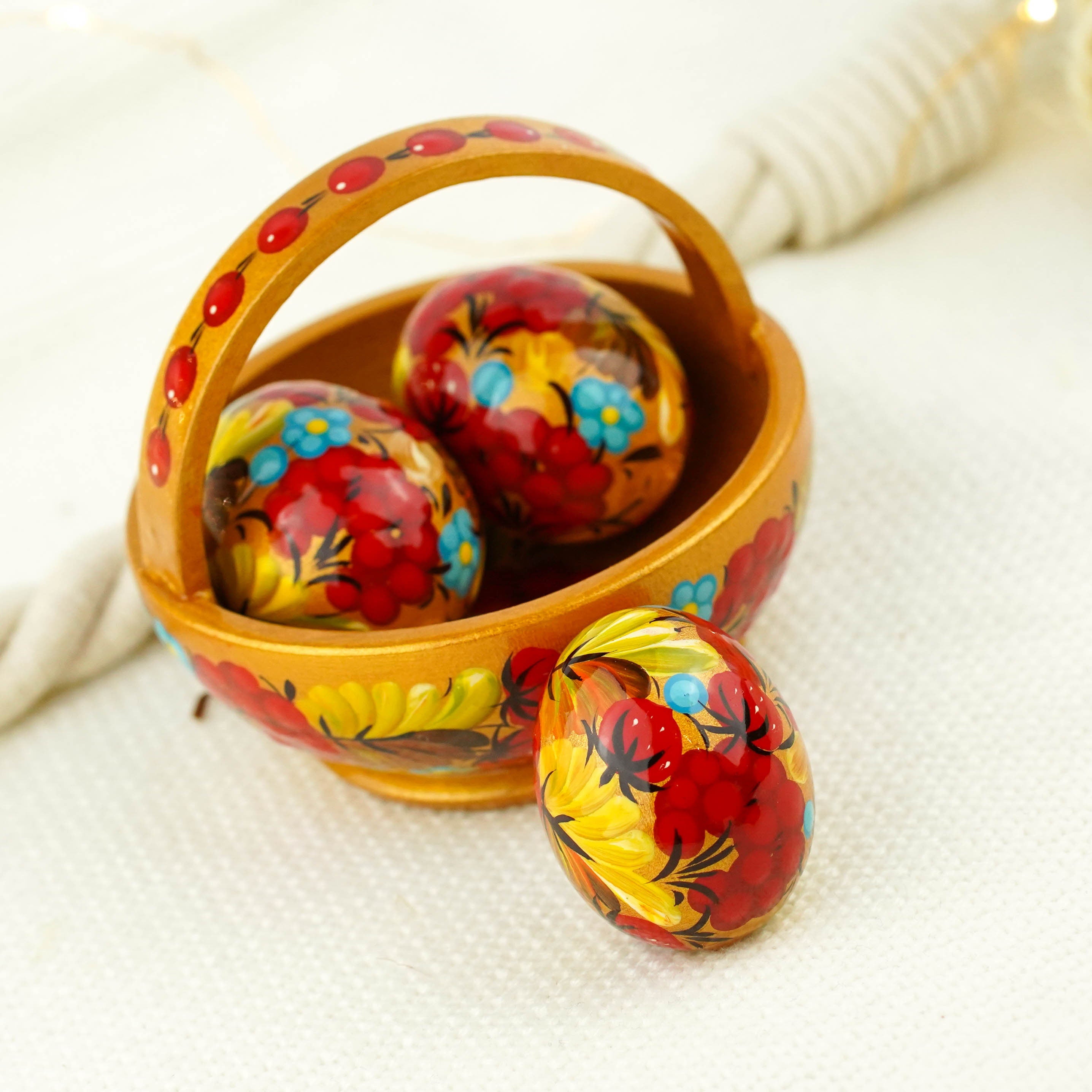 Wooden Easter basket with mini eggs, Painted small Petrykivka eggs, Red & gold flower Easter eggs in the basket, Cute Easter decor for home