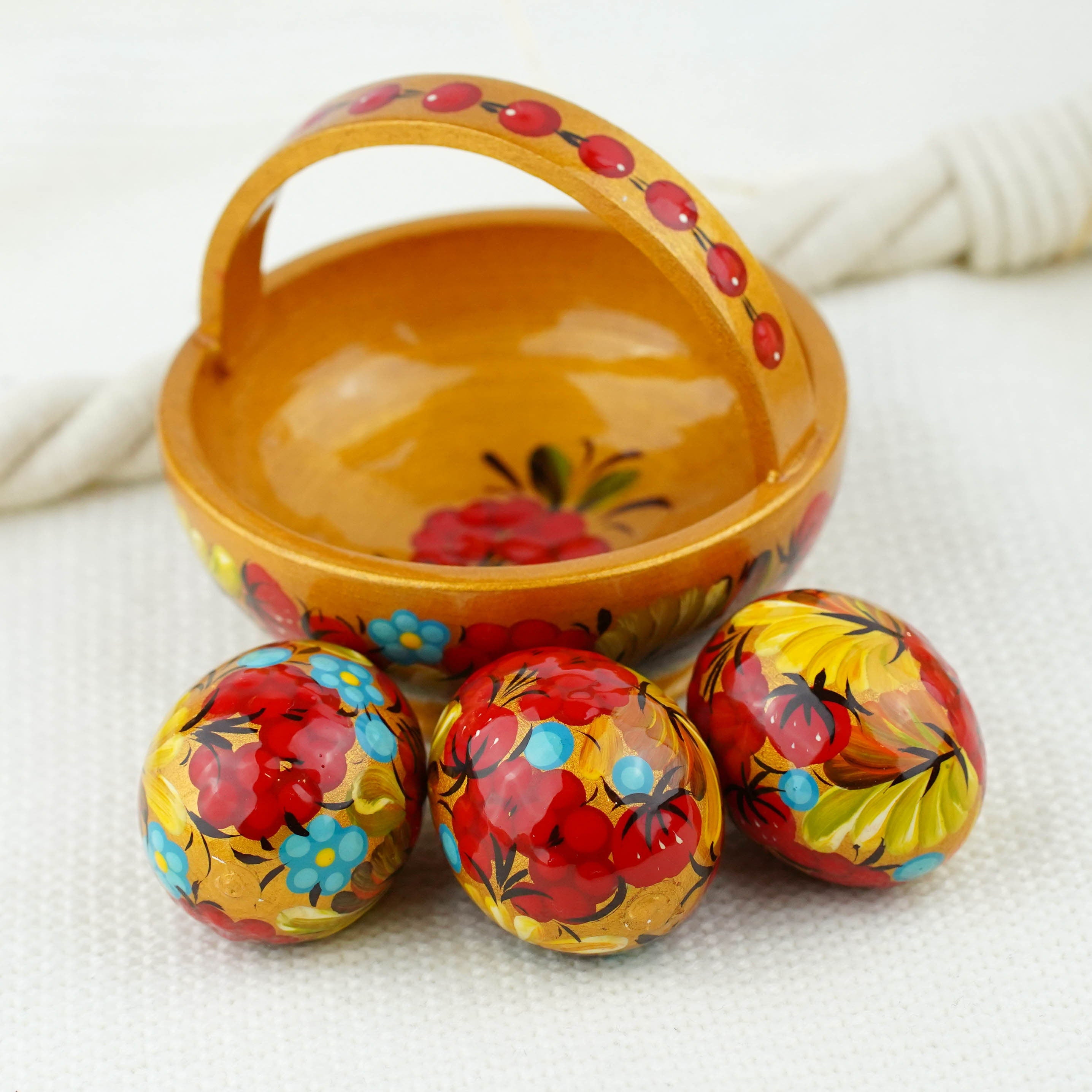 Wooden Easter basket with mini eggs, Painted small Petrykivka eggs, Red & gold flower Easter eggs in the basket, Cute Easter decor for home