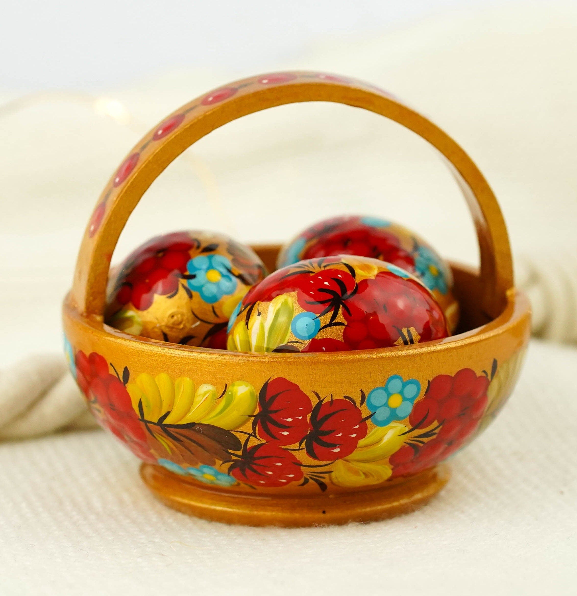 Wooden Easter basket with mini eggs, Painted small Petrykivka eggs, Red & gold flower Easter eggs in the basket, Cute Easter decor for home