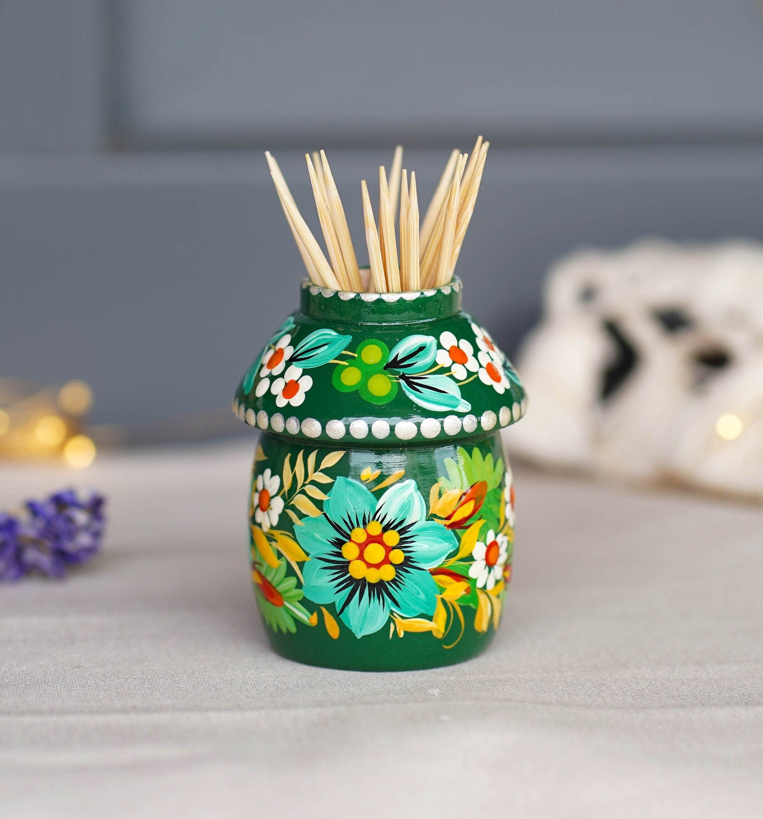 green wooden toothpick holder